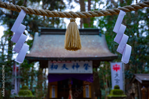 Big religious gate at Oomiya hachiman shrine in Tokyo photo