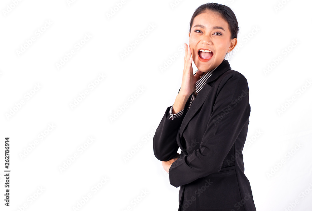 Portrait isolated Southeast Asian business woman wears dark gray suit action like got surprise news with white background and show feeling happy and amazed Portrait isolated Southeast Asian business woman wears dark gray suit action like got surprise news with white background and show feeling happy and amazed