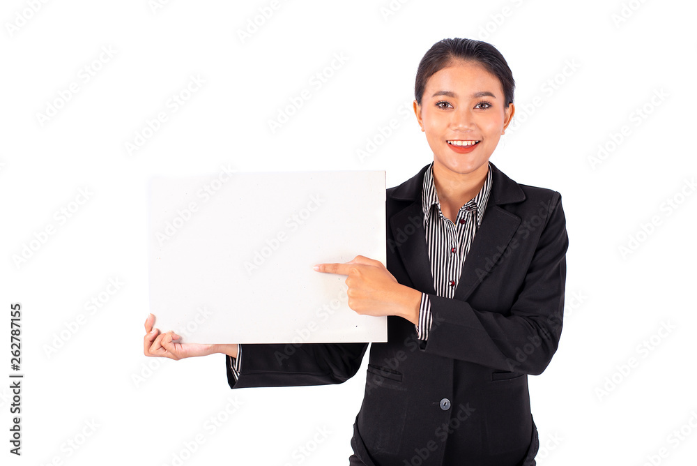 Portrait isolated Southeast Asian business woman wears dark gray suit point to blank white board or paper with white background and show feeling happy and cheerful Portrait isolated Southeast Asian business woman wears dark gray suit point to blank white board or paper with white background and show feeling happy and cheerful