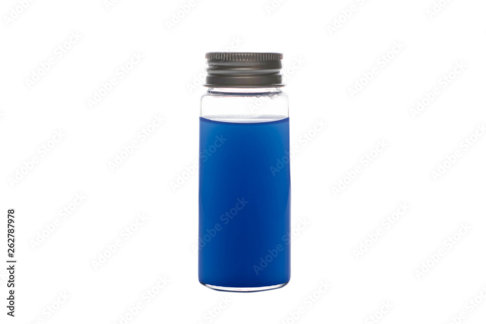 Glass jar with colored liquid on a white background, isolate Glass jar with colored liquid on a white background, isolate