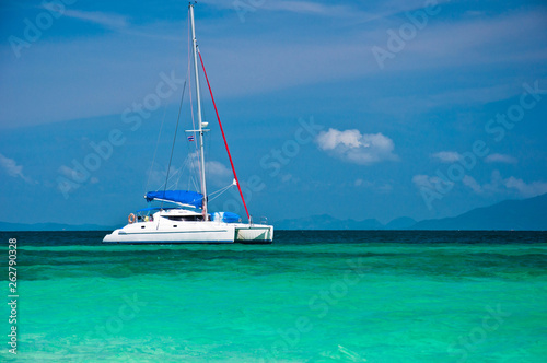 Small yacht in the sea with blue sky
