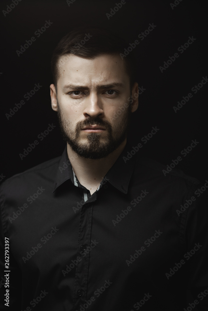 Portrait of Man in Black Indoors