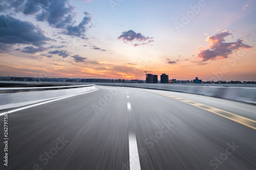 Motion-blurred highway in dusk clouds © onlyyouqj