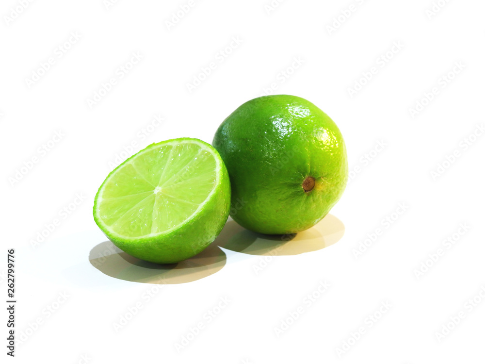 Lime with slice isolated on white background