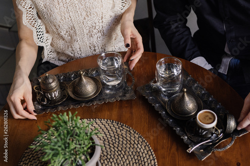 Turkish coffee and date in a coffee shop