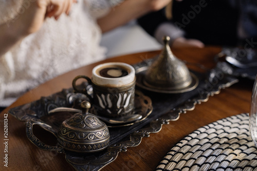 Fototapeta Naklejka Na Ścianę i Meble -  Turkish coffee and date in a coffee shop