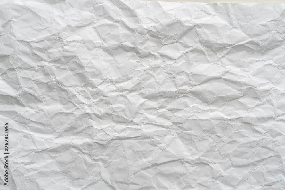 Fototapeta premium Crumpled white paper background texture