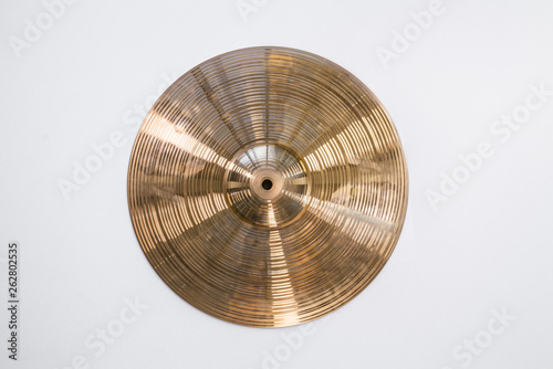 Drum plate, drum set on a white background, musical cymbals top view