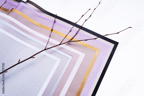 Colorful sheets of paper on a white background. Abstract background with wrapping paper photo