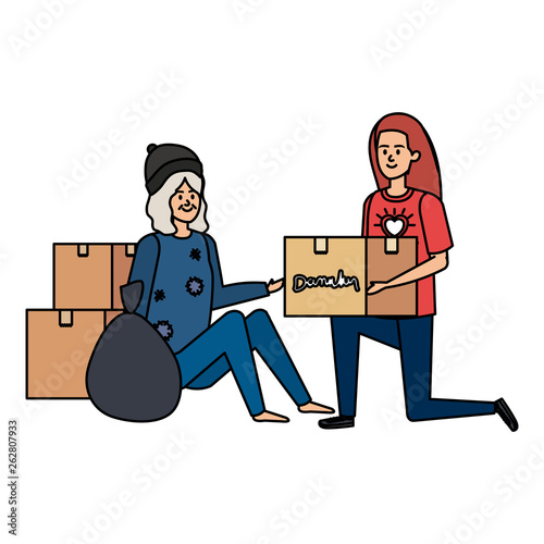 woman volunteer giving a homeless woman donations box