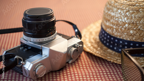 Camera sunglasses and a hat for travel
