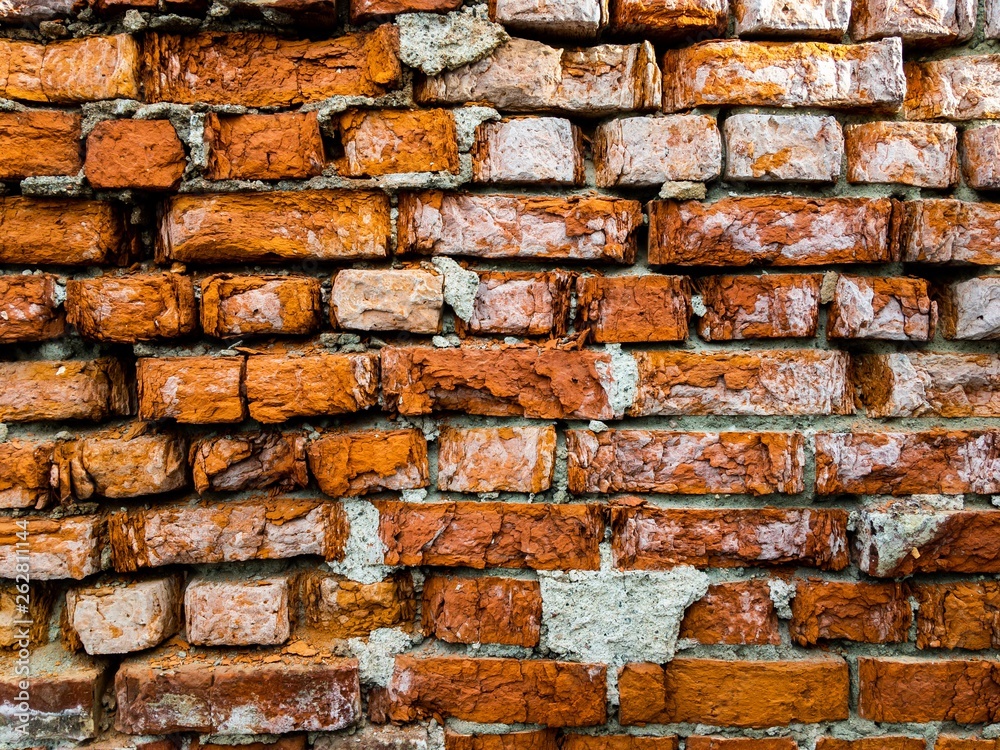 old wall of red broken brick old wall of red broken brick
