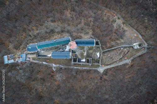 Bezděz Castle is a Gothic castle located some 20 kilometres (12 mi) southeast of Česká Lípa, in the Liberec Region, Northern Bohemia, Czech Republic. Its construction began before photo