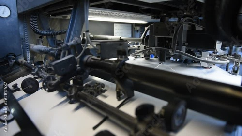 Wallpaper Mural Offset printing. Printed sheets of paper are served in the printing press by vacuum Torontodigital.ca