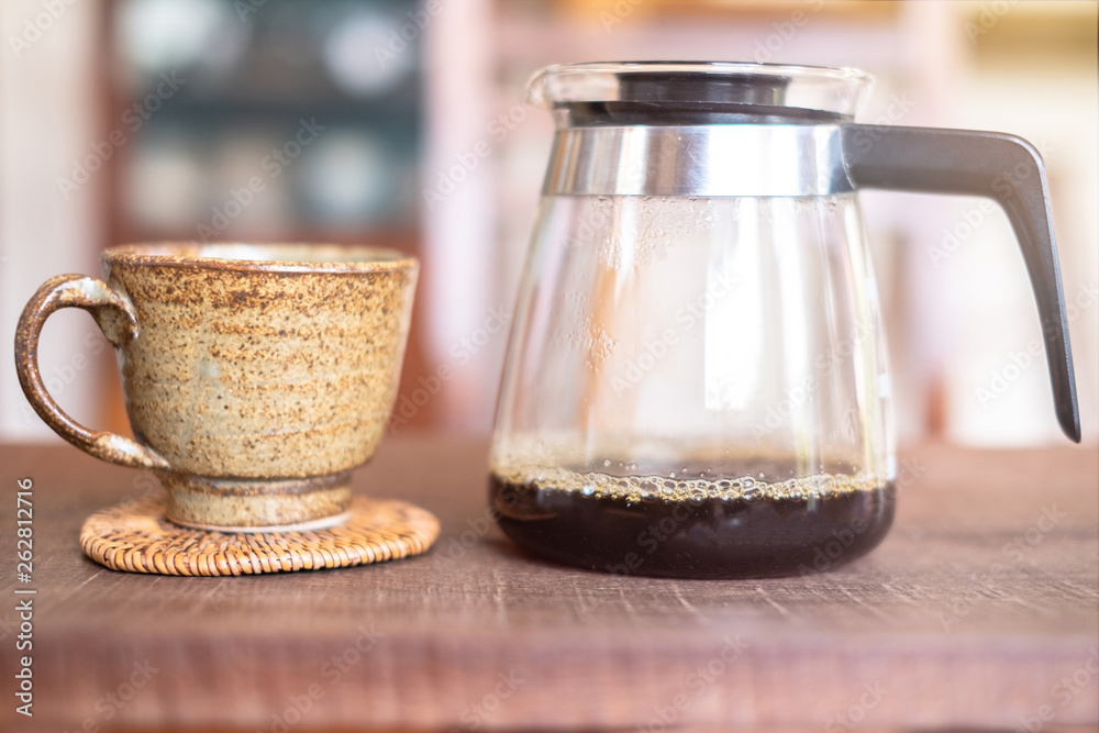 Close up of coffee drip brewing gadgets on wooden bar counter, background Close up of coffee drip brewing gadgets on wooden bar counter, background