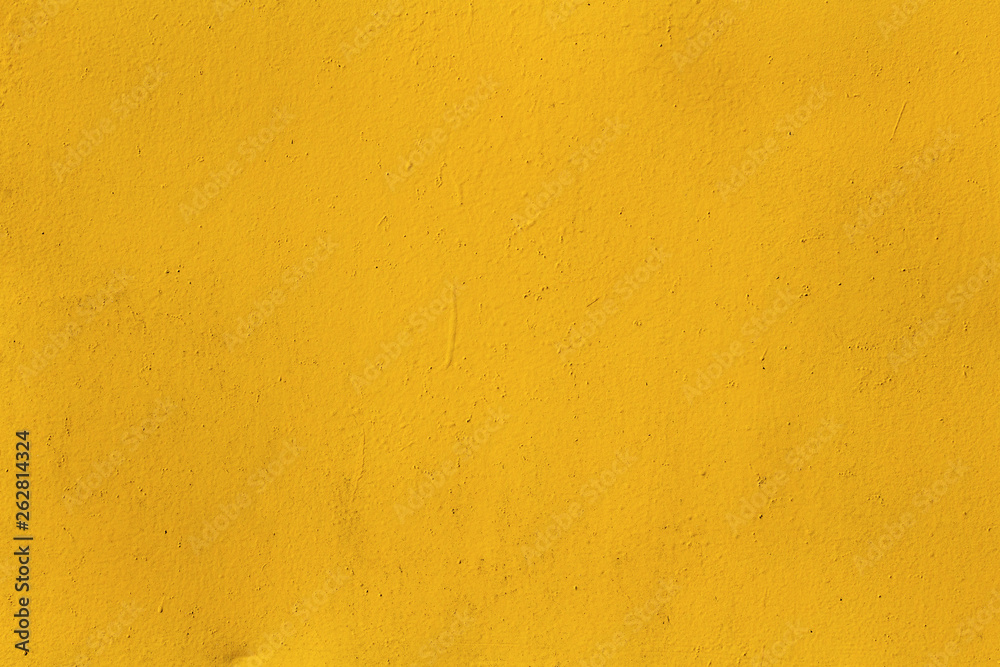 Yellow old cracked rusty damaged painted metal background texture close-up Yellow old cracked rusty damaged painted metal background texture close-up