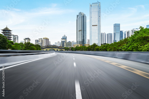 The expressway and the modern city skyline are in chengdu, China.