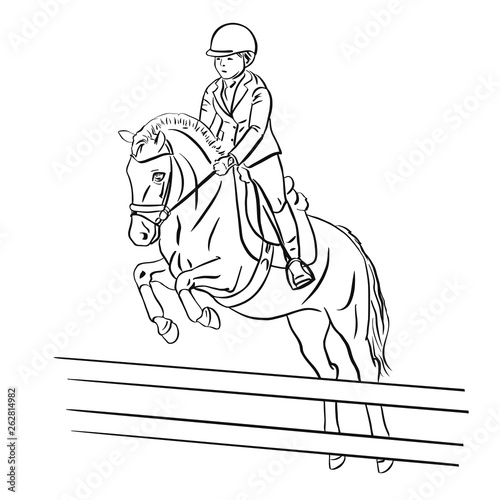 Children's sport. A young rider with horse jumping over an obstacle.