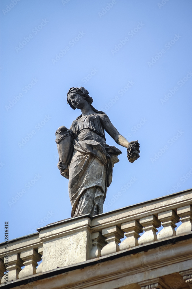 Obraz premium Statue on the roof of Palace on the Water also called Lazienki Palace in Royal Lazienki park in Warsaw, capital city of Poland