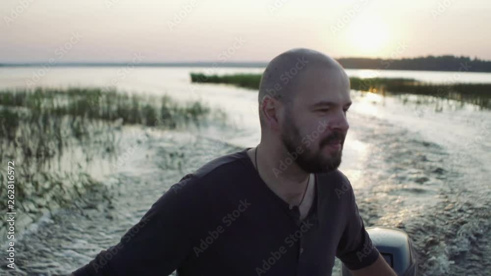 slow-motion man drive motorboat close up male rest, freedom, travel by water transport slow-motion man drive motorboat close up male rest, freedom, travel by water transport