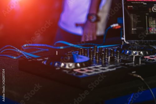 Young man playing music at the club