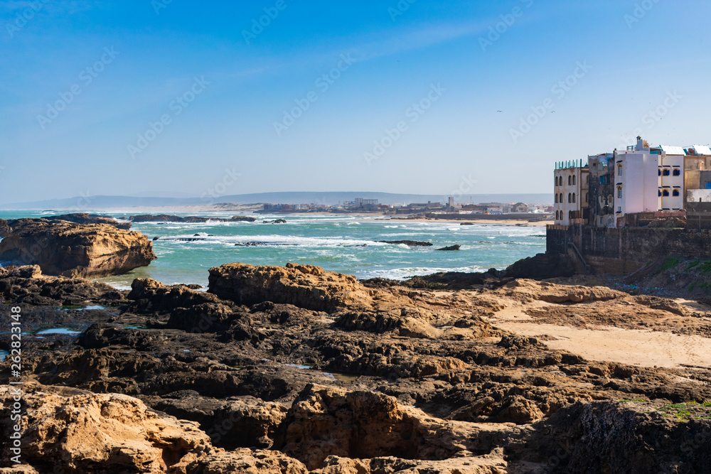 A Rocky Coastline with Buildings and the Atlantic Ocean in Essaouira Morocco