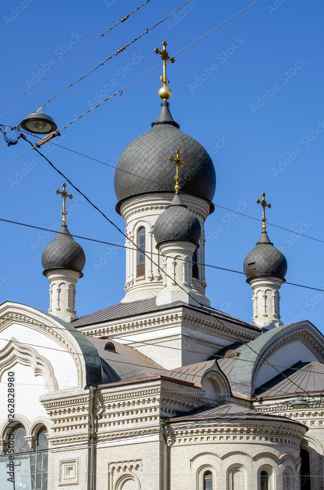 Copper domes and Golden crosses of the Church Of our lady of Kazan