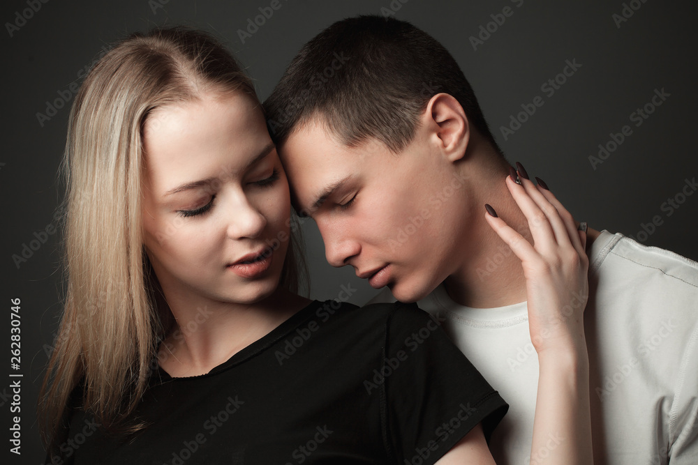 Couple in love on the black background Couple in love on the black background