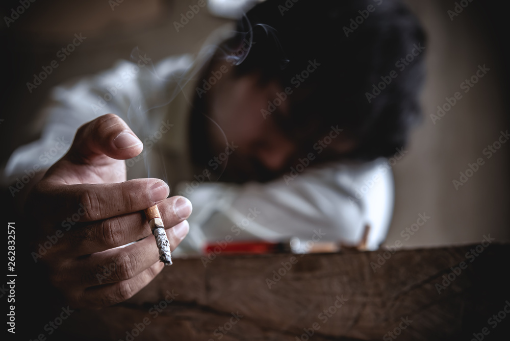 Asian Stress man smoking,Thailand people,No tobacco day concept,DIe from smoke smoking cigarette