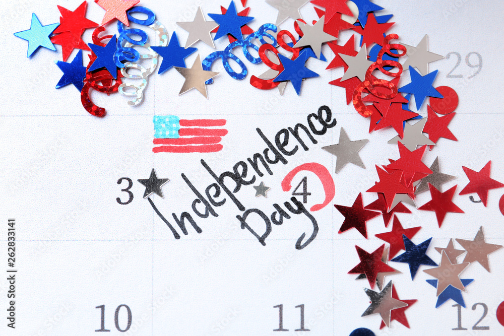 Composition with calendar and colorful confetti. USA Independence Day