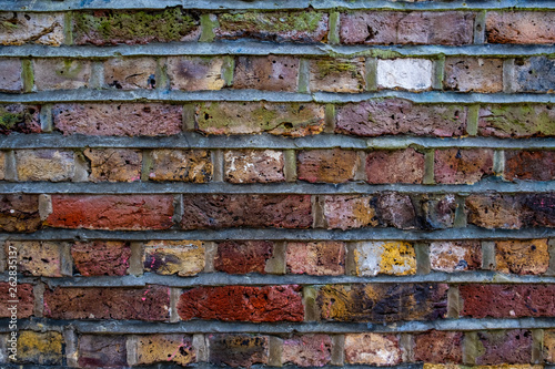 old brick wall of red bricks