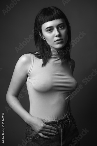 Attractive young woman in shirt. Black and white photo