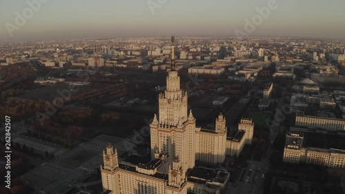 Aerial footage of stalins ussr skysraper in Moscow center. Spring. Sunset. Sun glare. HEVC/H.265, D-Cinelike, Dlog-M, photo