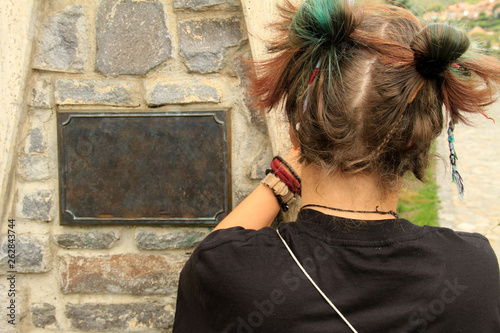 Colored hair capture from behind a young girl