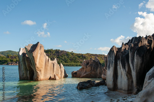 granite rocks, turquoise water in the Marine national park in Curieuse Island, seychelles