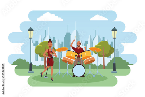 musician playing drums and singing