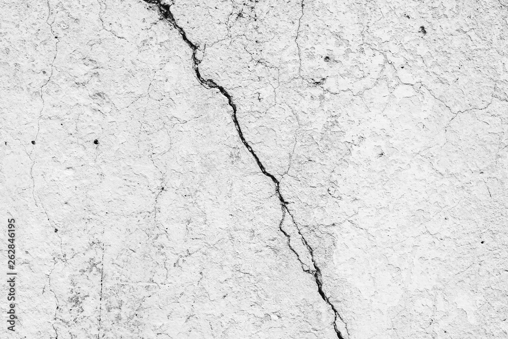 Wall fragment with scratches and cracks