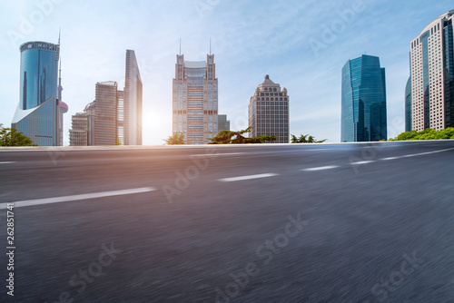 Canvas Print Empty Asphalt Road Through Modern City of Shanghai, China..