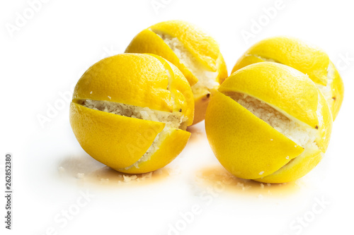 Moroccan preserved salted lemons isolated on white