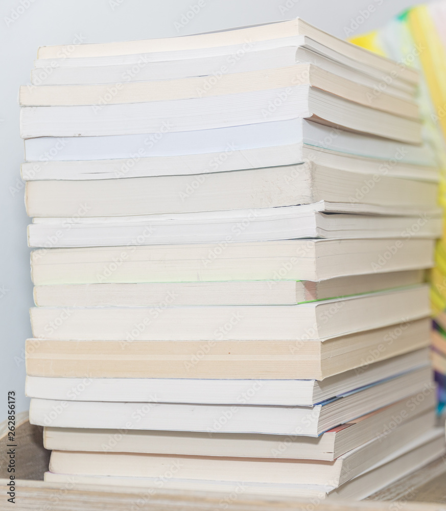 Stack of colorful books on background - Image Stack of colorful books on background - Image