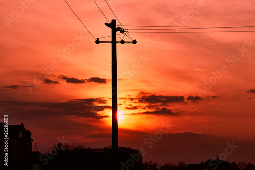 electric post and sunrise landscape , electricity poles with beautiful sunset © Mykhailo