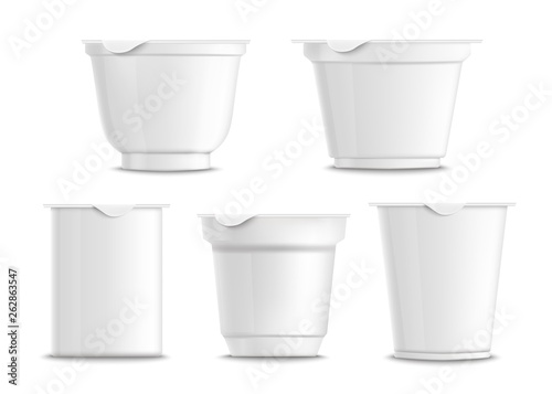 Set of empty and blank white plastic yogurt containers.