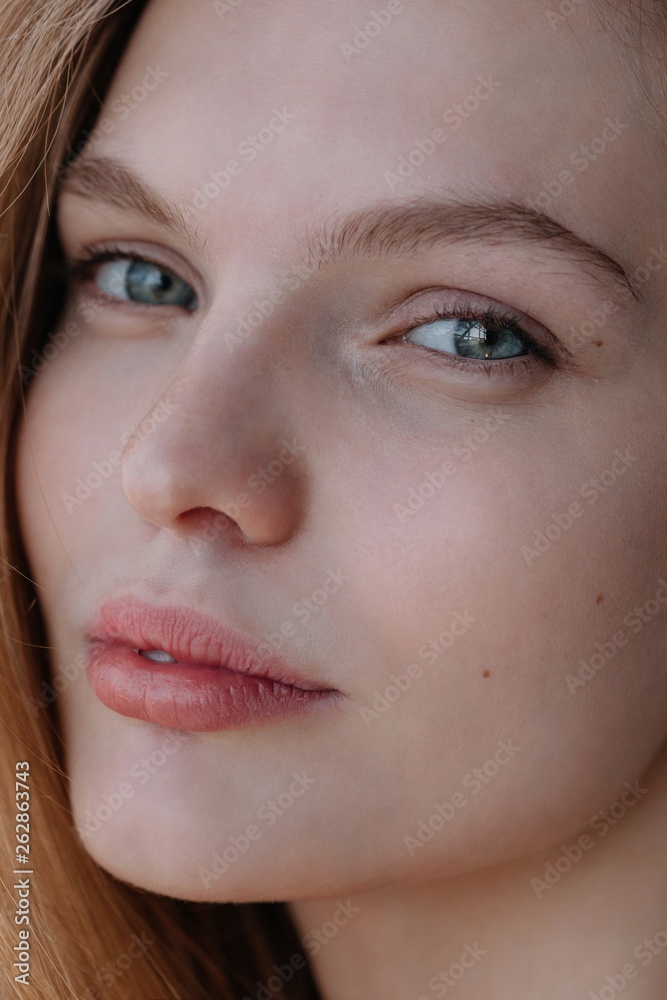 Closeup beauty portrait of attractive young woman Closeup beauty portrait of attractive young woman