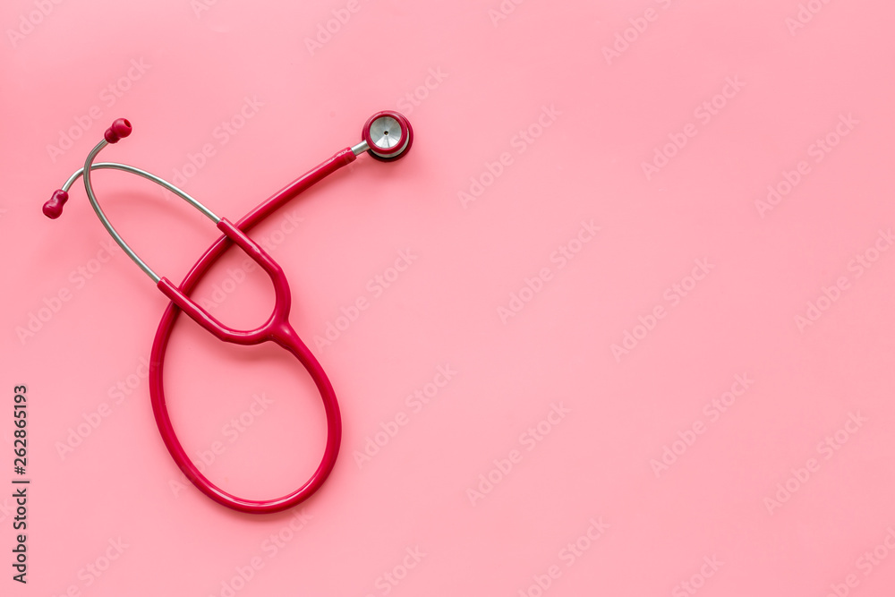 family doctor desk with stethoscope on pink background top view mock up family doctor desk with stethoscope on pink background top view mock up