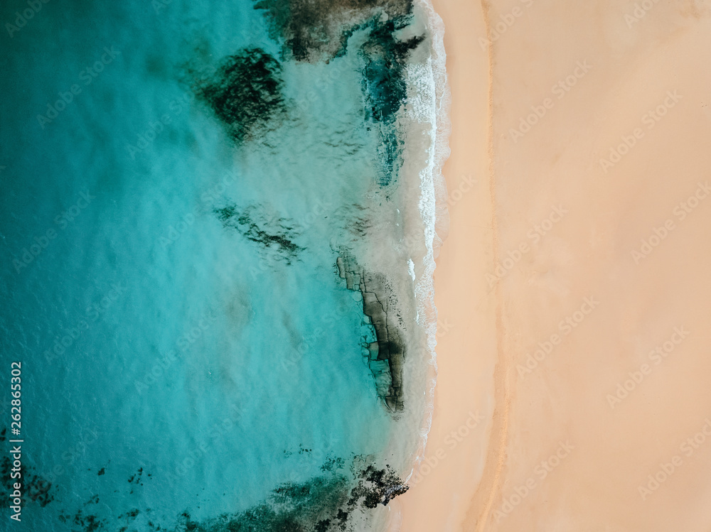 Aerial view of an empty tropical beach with copy space