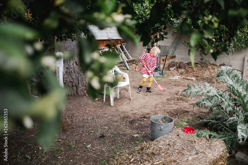 view of intel girl working in her yard photo