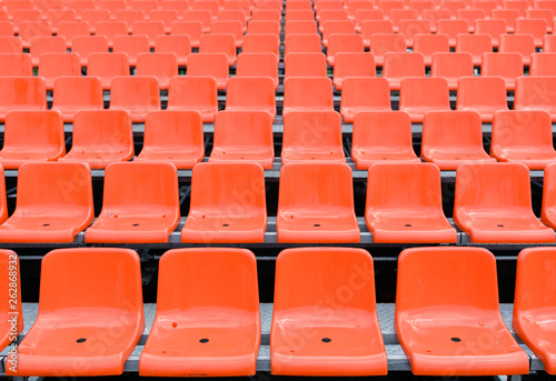 Empty red seats in the stadium photo