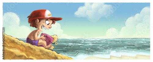niño jugando en la playa photo