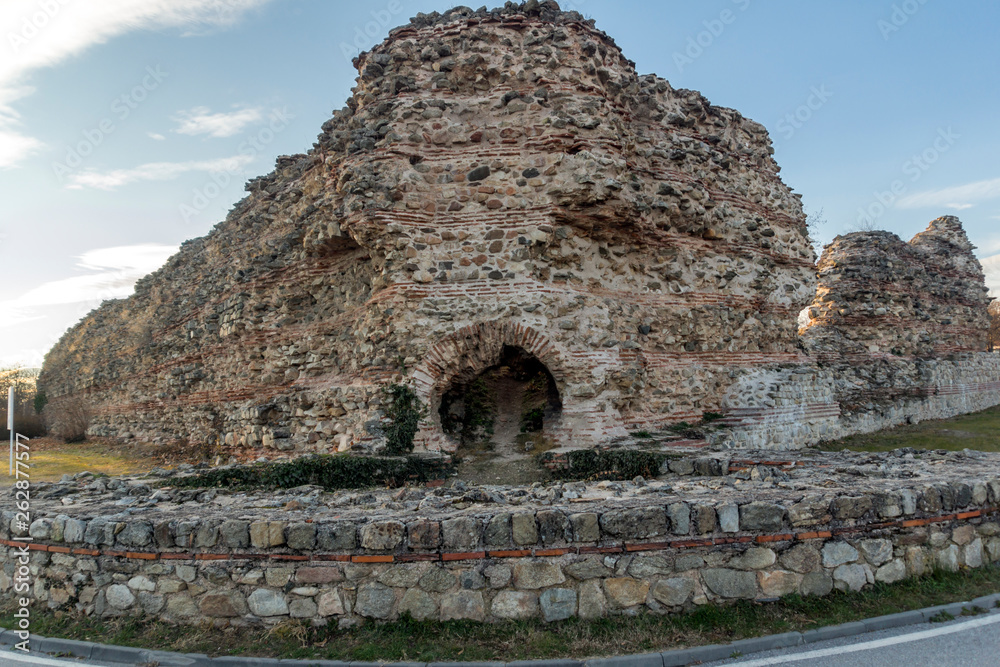 Fototapeta premium Sunset view of Ruins of fortifications in ancient Roman city of Diocletianopolis, town of Hisarya, Plovdiv Region, Bulgaria