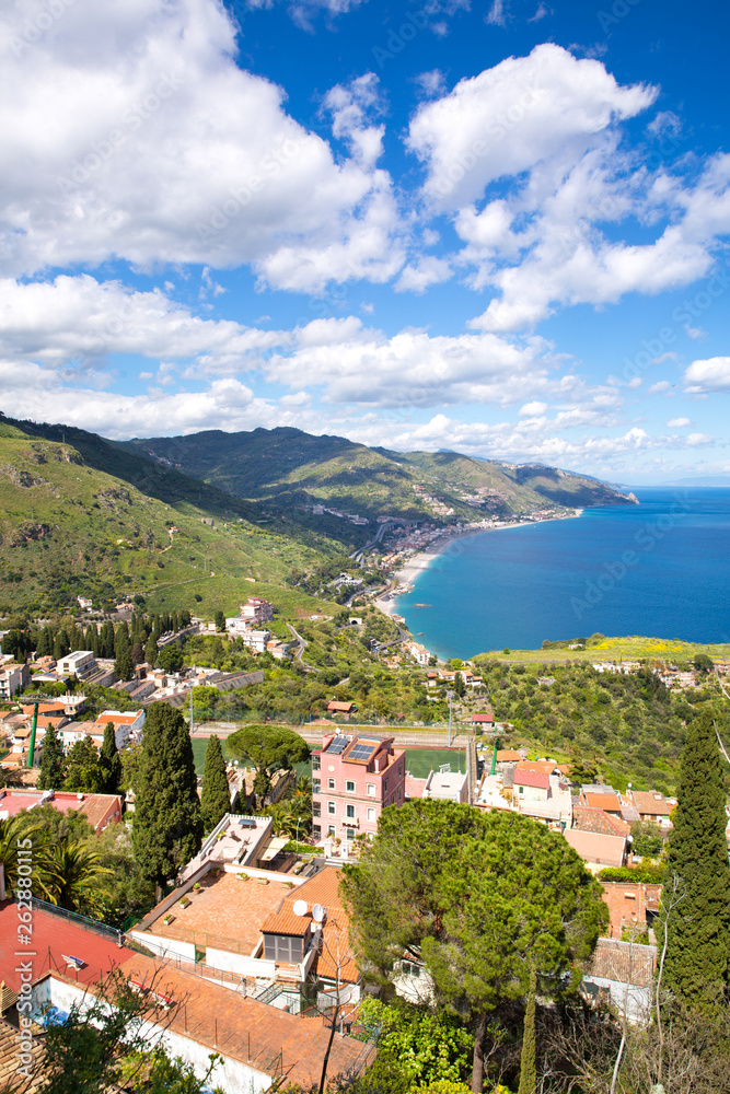 Sicily, Italy. Ionian sea and beautiful mountains landscape in bright summer day, Taormina.  